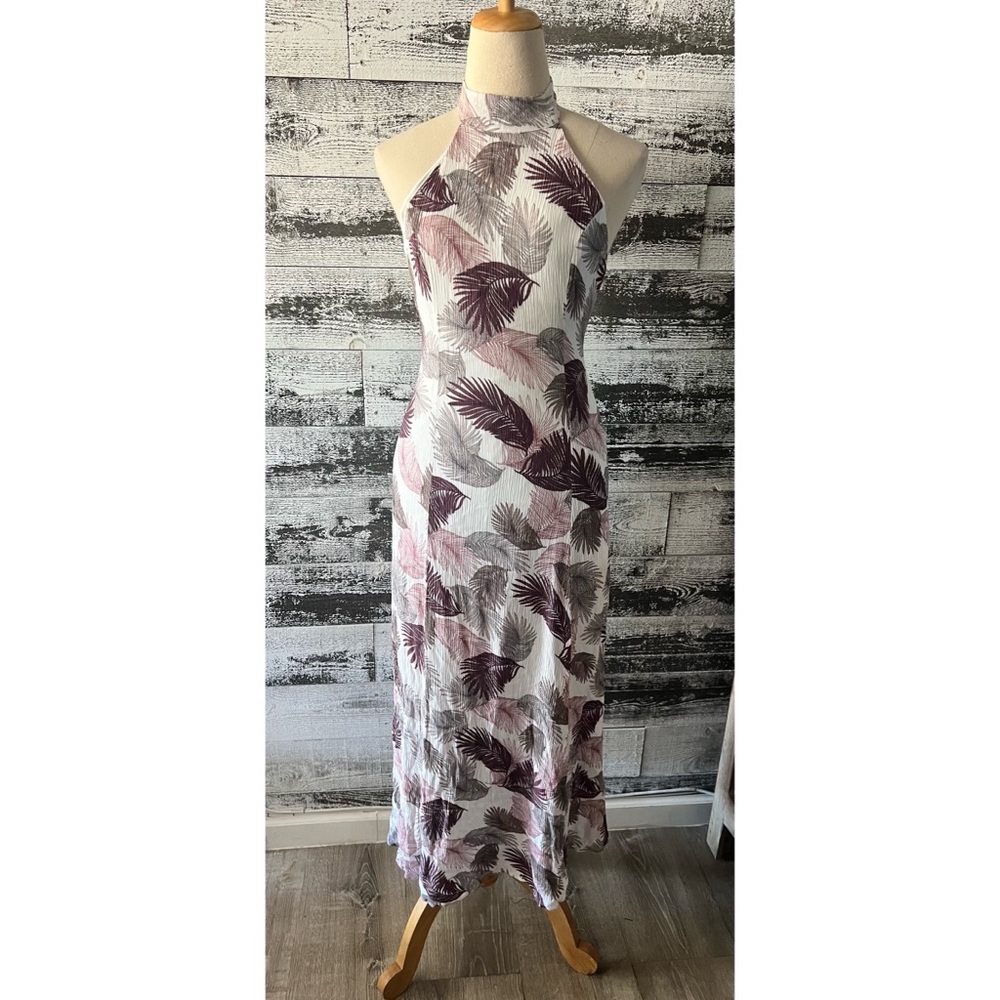 Hommage sexy floral form fitting dress with side slits.